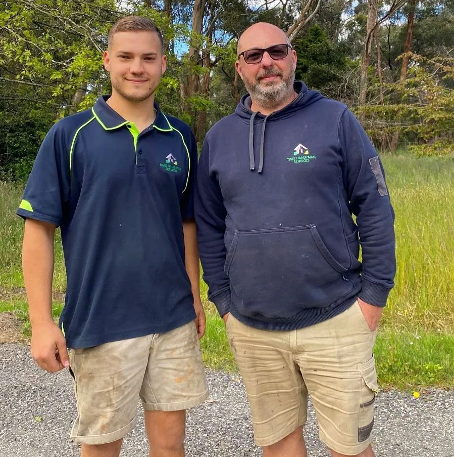 Employers How apprentices and trainees can grow your business Tim apprentice and employer standing looking at viewer outside bermuda shorts clothing grass hiking human face man outdoor person plant polo shirt posing shorts sleeve smile standing t-shirt tree