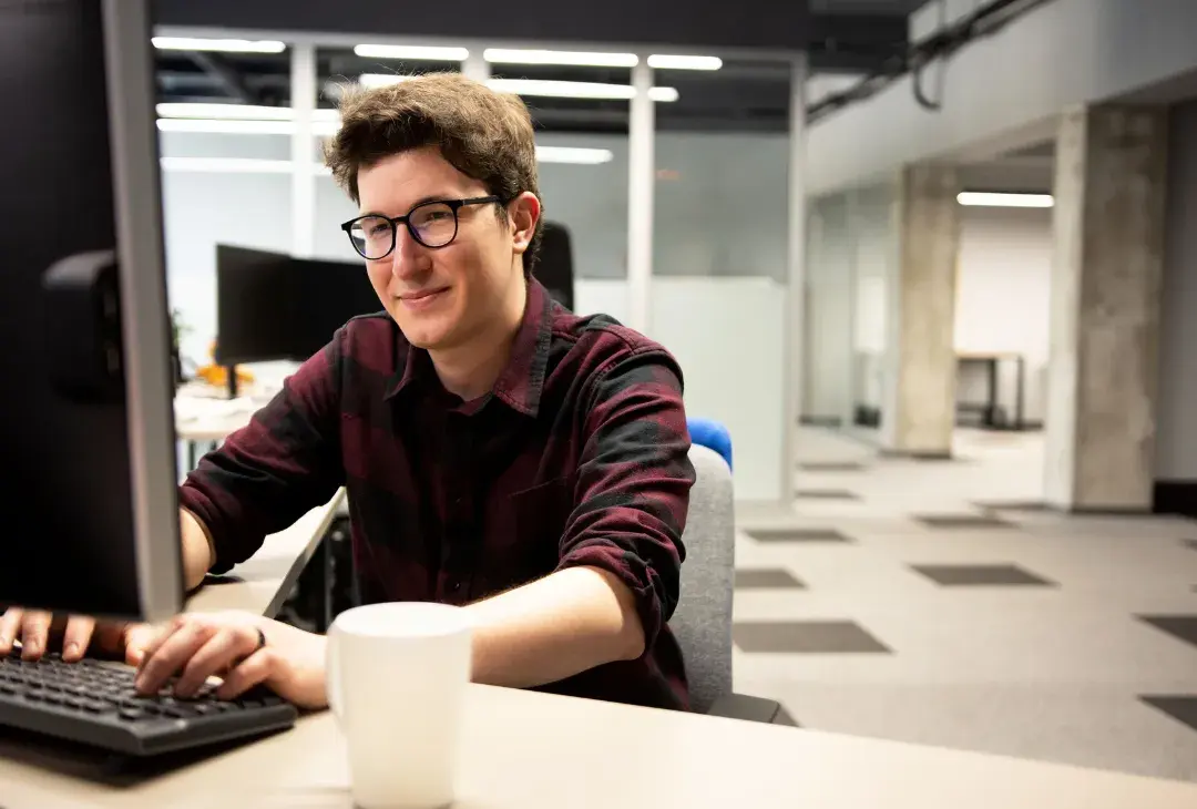 Male trainee within an IT environment