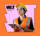 Cutout of worker in hi vis and PPE holding tablet on a pink and orange stylised background