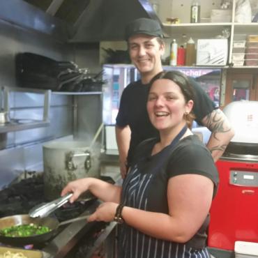 Cooker apprentice with her chef