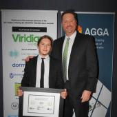 Glass Industry Apprentice of the year receiving his reward