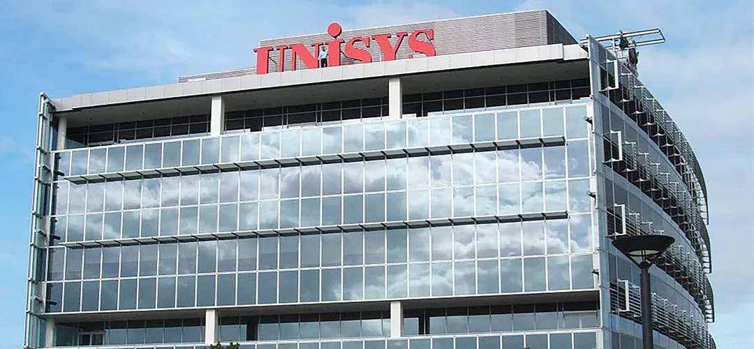 Unysis building with a blue sky surrounding it
